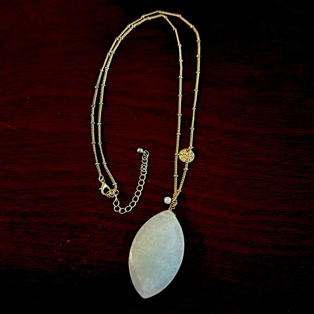 Quartz Crystal Leaf necklace on gold colored rope chain